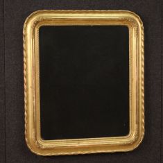 Specchio italiano con cornice scolpita e dorata epoca 800