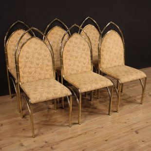 Sei sedie italiane di design in metallo dorato